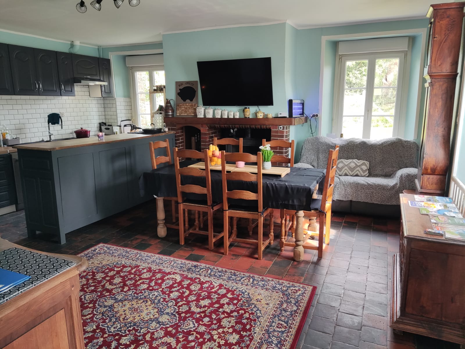 Living and dining area at Marianne Cottage