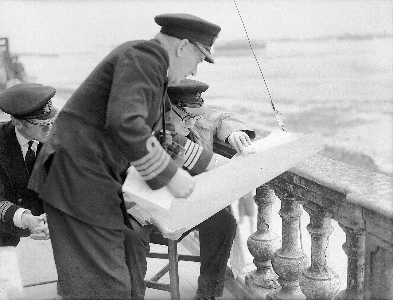 Captain Hickling shows Winston Churchill a plan of Mulberry Harbour 'B', July 1944