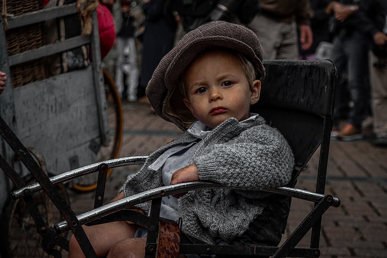 French children in 1940s clothing during D-Day re-enactment in Carentan, June 2022
